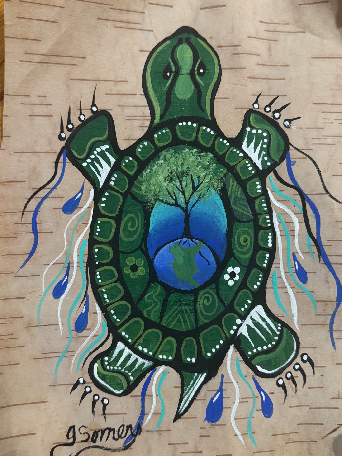 Jessica Somers facilitating a land-based learning session focused on identifying traditional Wabanaki design elements in the natural environment.